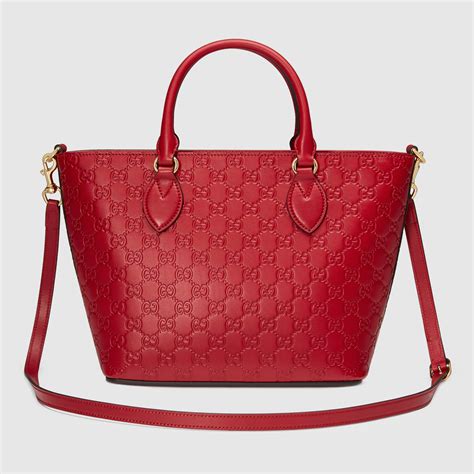 gucci women's tote bag red with gold buckle pocket|gucci tote bag outlet.